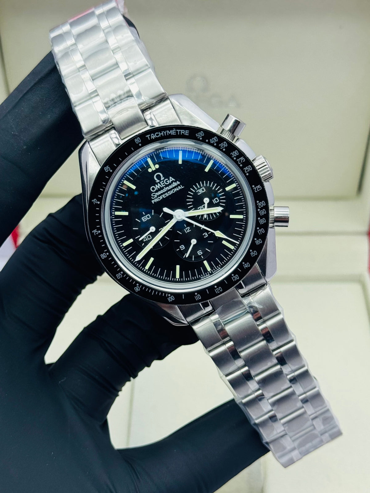 OMEGA SPEEDMASTER AUTOMATIC TRIPLE CHRONOGRAPHIC CHAIN MODEL IN SILVER