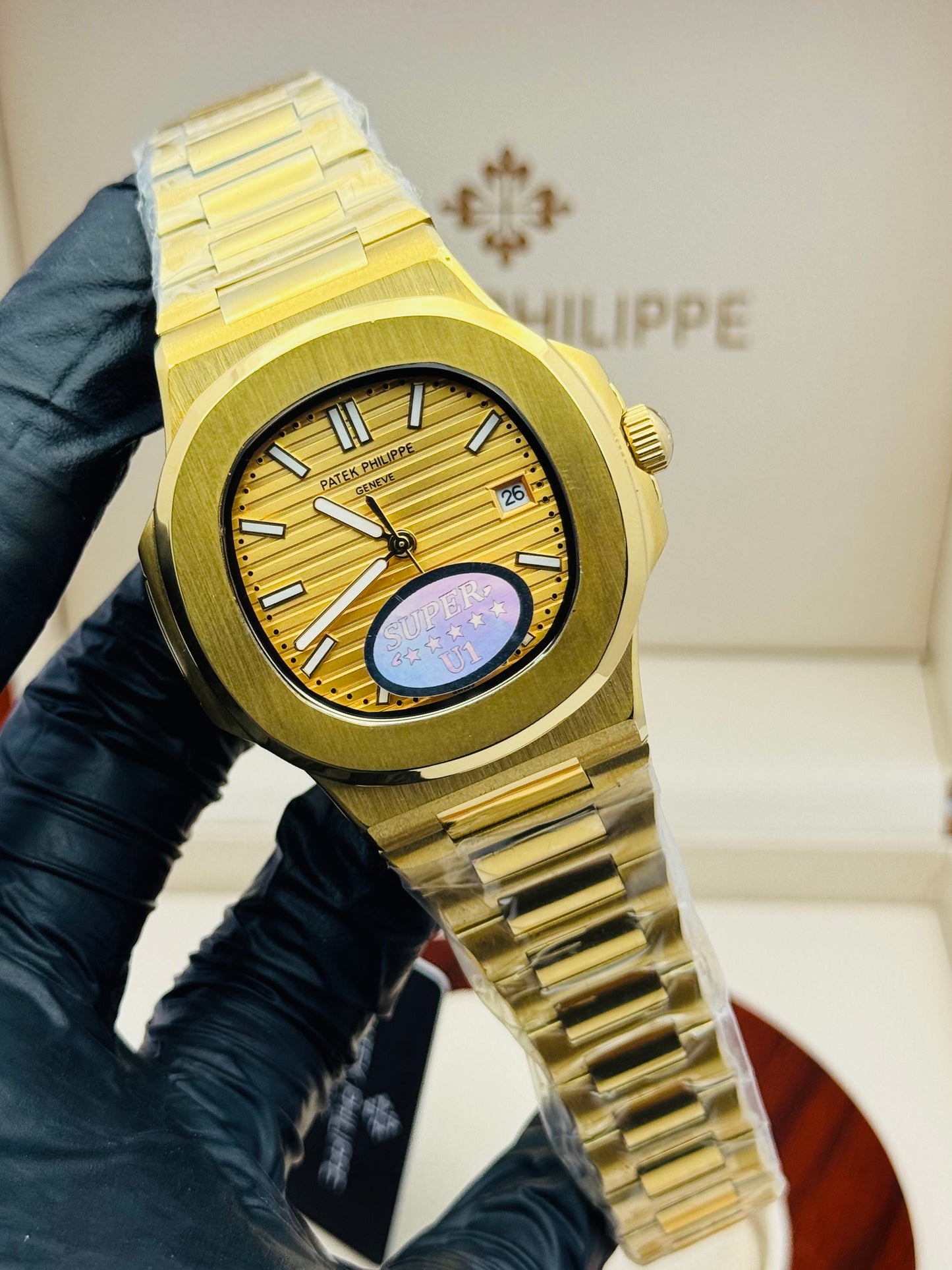 PATEK PHILLIPE NAUTILUS GOLDEN AUTOMATIC